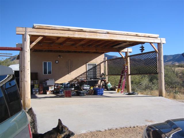 The carport is constructed with 2 x 4 metal studs and insulated. Rainwater is also harvested from this roof.