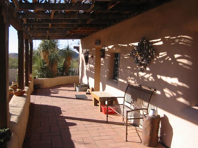 The porch goes all the way around the house as the next four pictures show.
This one is the front of the house.
